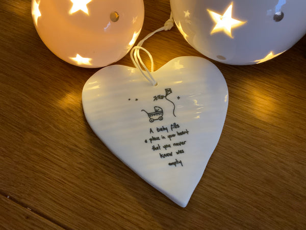 A baby fills your heart porcelain hanging heart - East of India - New for 2021